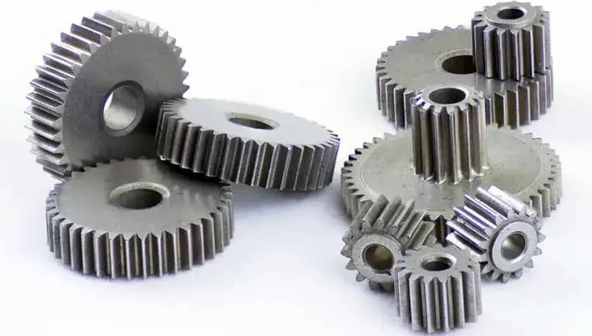 Sintered gears produced via Metal Injection Moulding (MIM) combine the strengths of both MIM technology and sintering processes